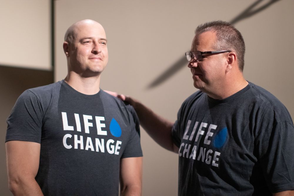 Sharing the hope of Jesus during a baptism at The Village Christian Church in Minooka, IL